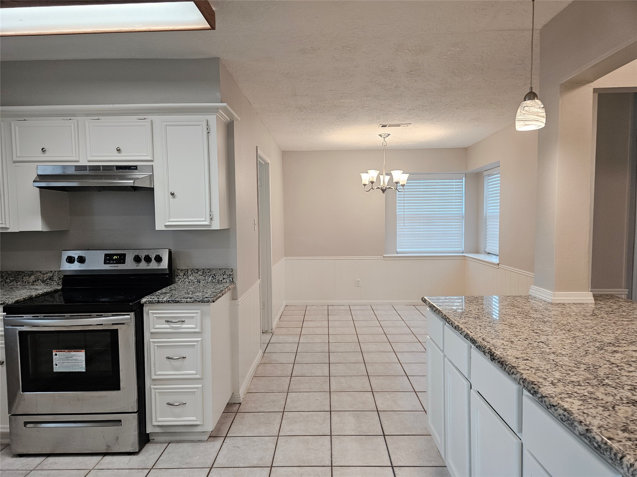 6126 Inway Drive Spring, TX 77389 - Photo 9 of 27 a kitchen with a stove and a sink