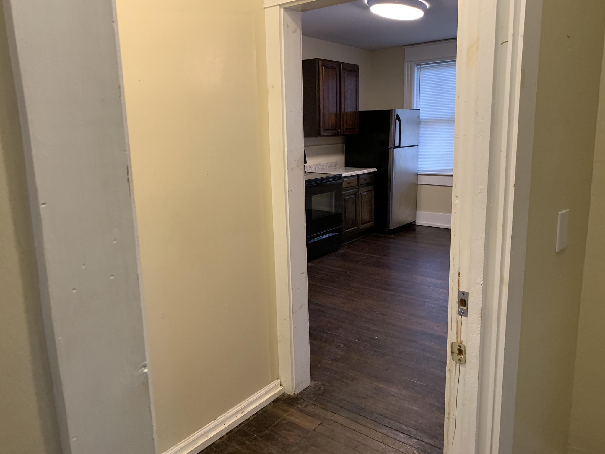 312 13th Street Southwest, Unit 4 (2B) Roanoke, VA 24016 - Photo 5 of 12 a view of a kitchen from the hallway
