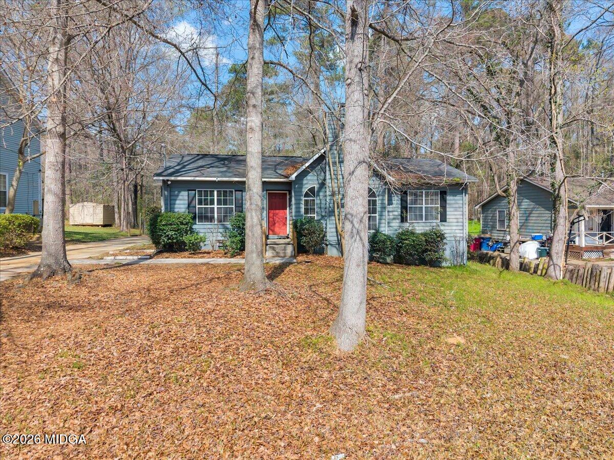 616 Will Scarlet Way Macon, GA 31220 - Photo 1 of 5 a front view of house with yard and green space