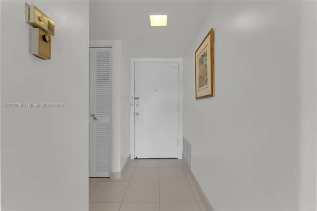 a spacious bedroom with a bed and window