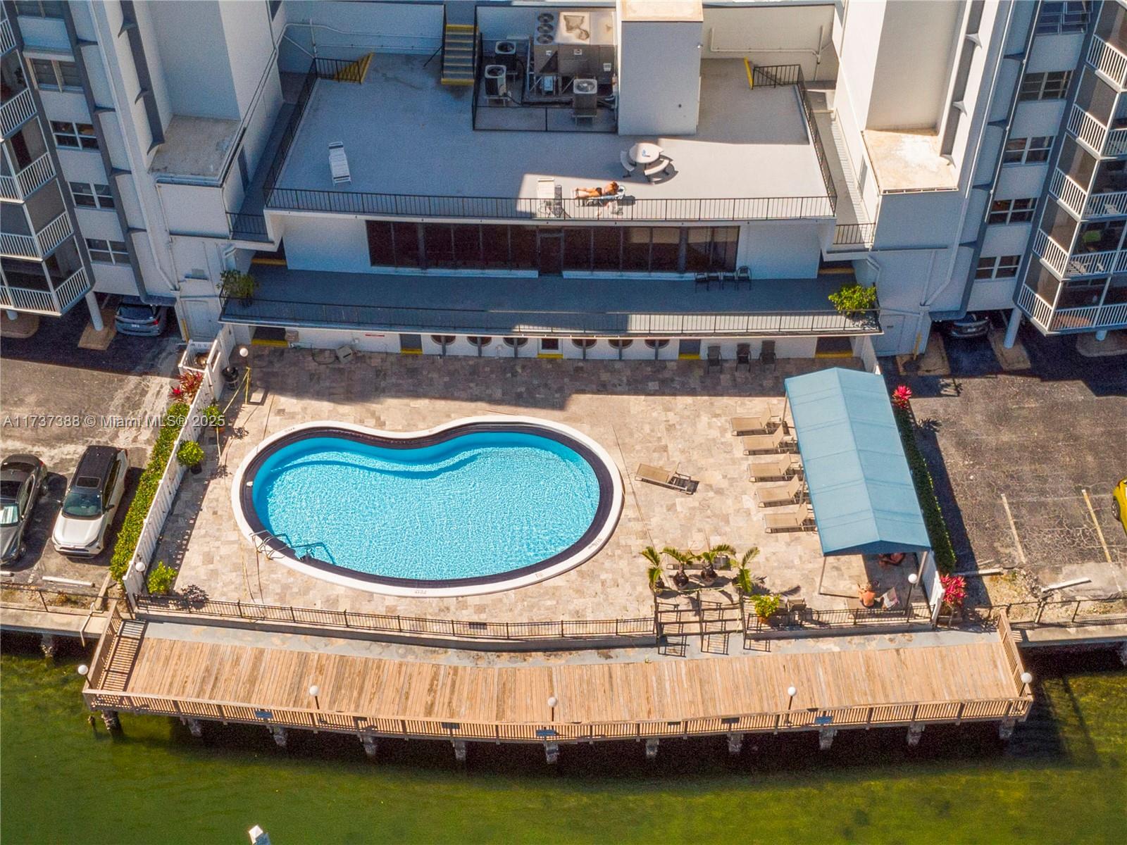 200 Diplomat Parkway, Unit 229 Hallandale Beach, FL 33009 - Photo 27 of 30 an aerial view of a house with swimming pool