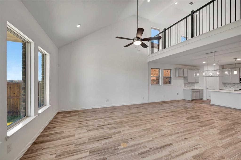 3704 Water Lily Way Prosper, TX 75078 - Photo 17 of 40 a view of empty room with wooden floor and fan