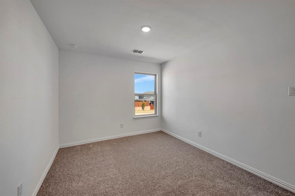 3704 Water Lily Way Prosper, TX 75078 - Photo 30 of 40 an empty room with a window
