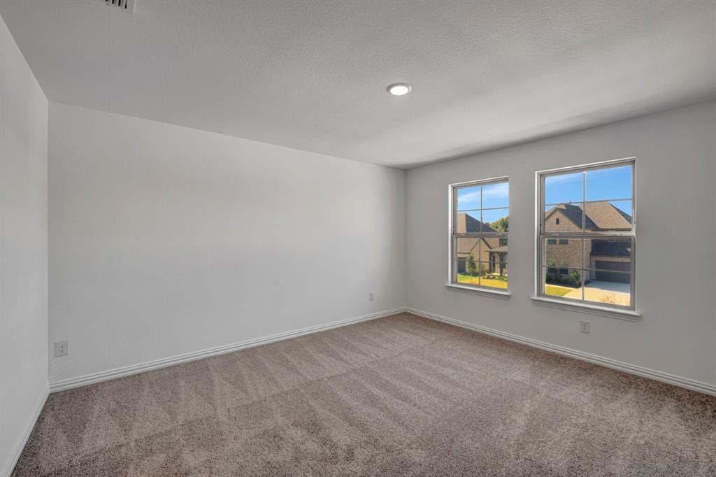 3704 Water Lily Way Prosper, TX 75078 - Photo 32 of 40 an empty room with windows
