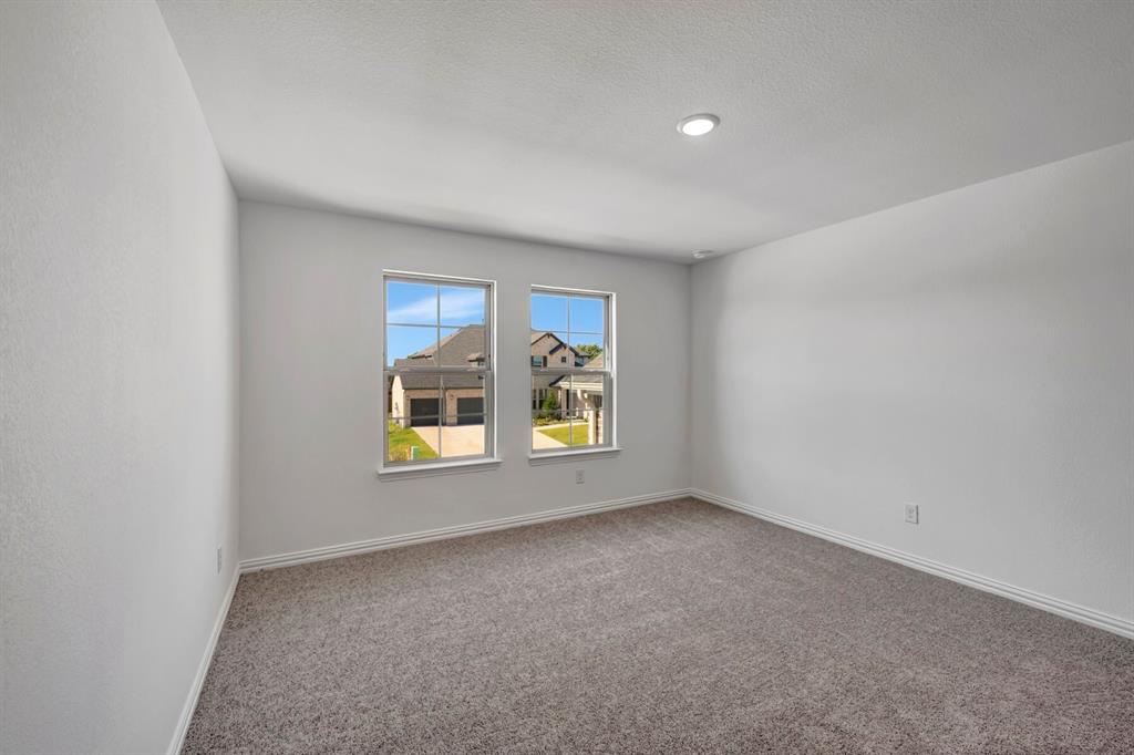 3704 Water Lily Way Prosper, TX 75078 - Photo 33 of 40 an empty room with windows