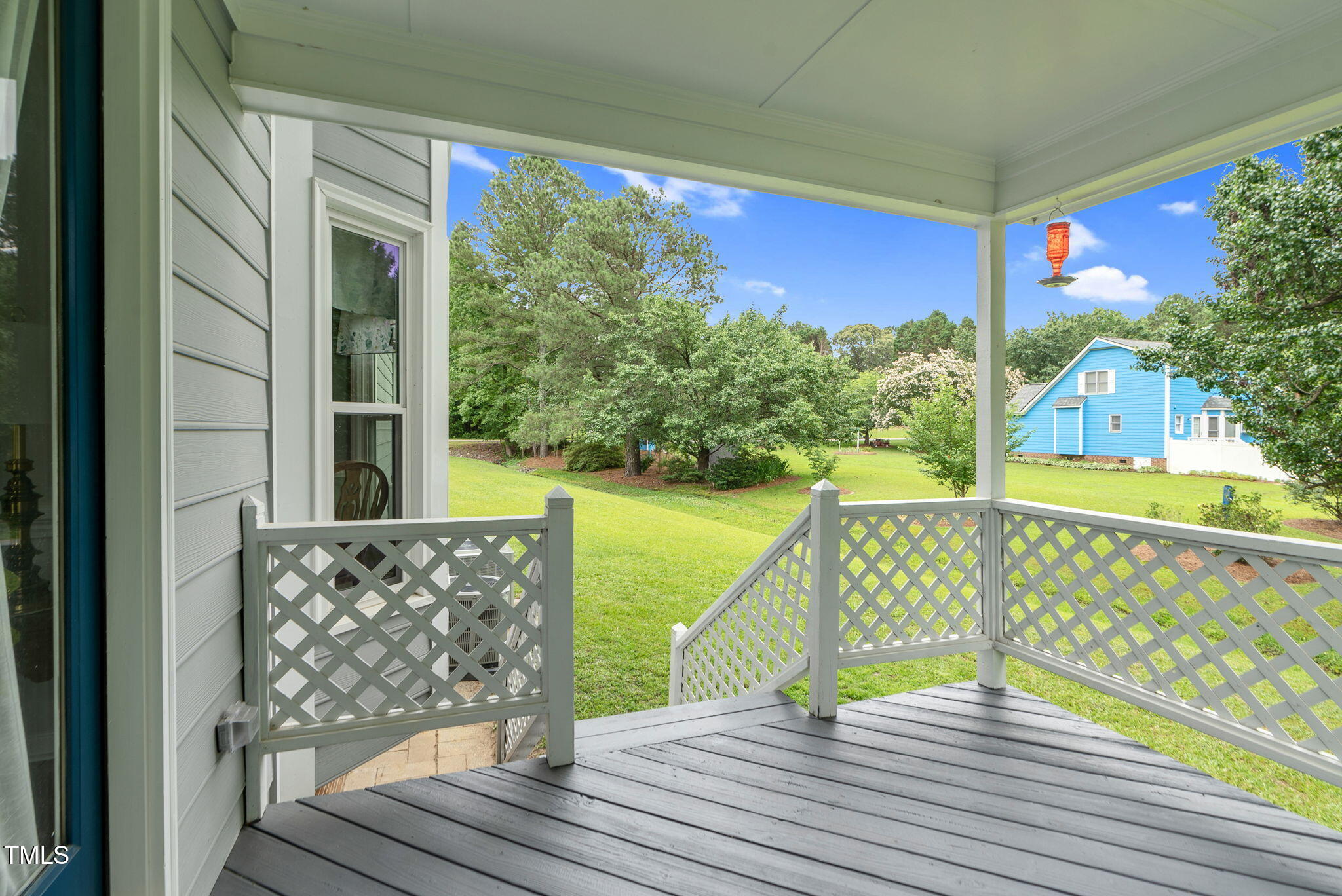 209 Bradley Drive Benson, NC 27504 - Photo 18 of 20 a view of balcony with wooden floor