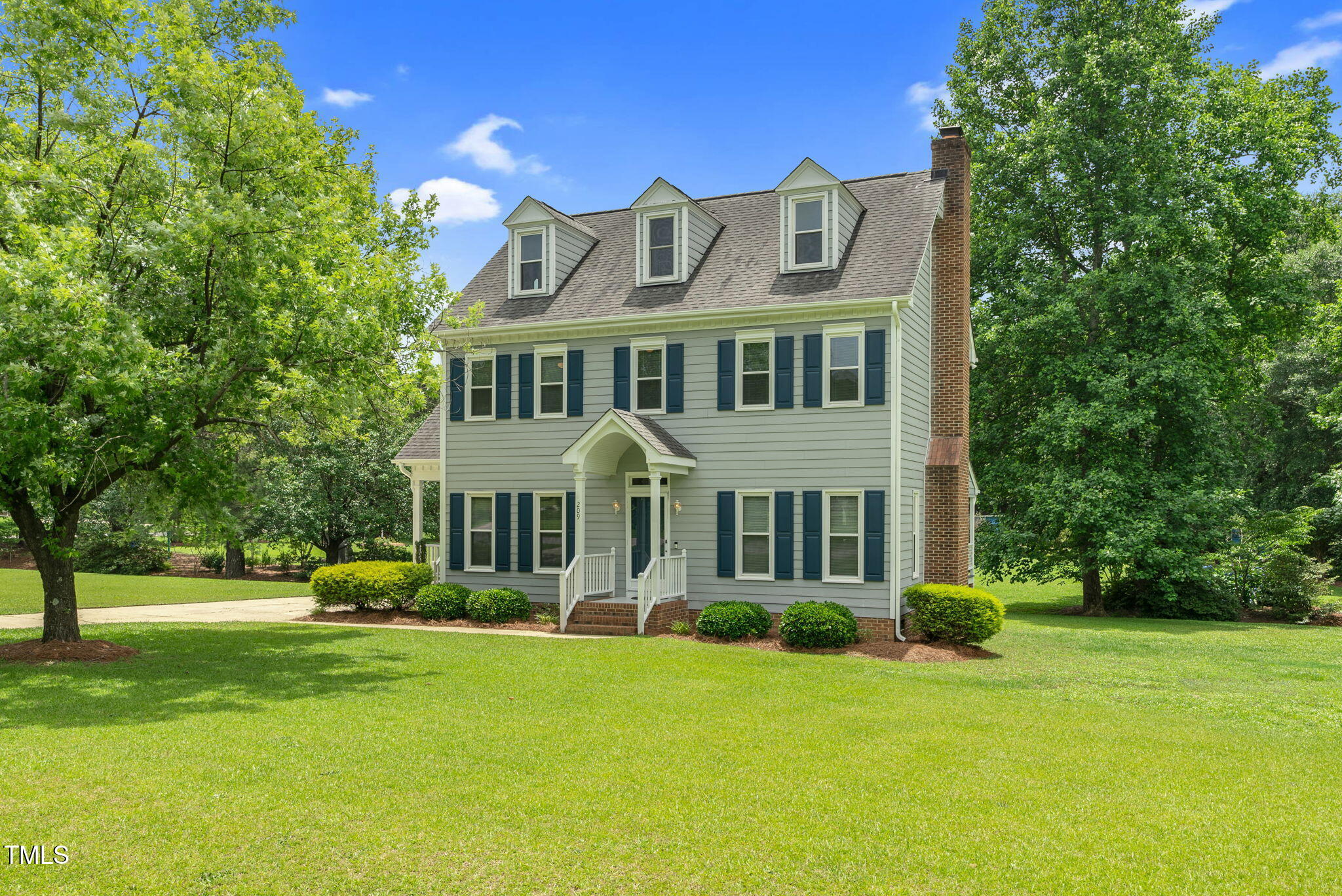 209 Bradley Drive Benson, NC 27504 - Photo 3 of 20 a front view of a house with a yard