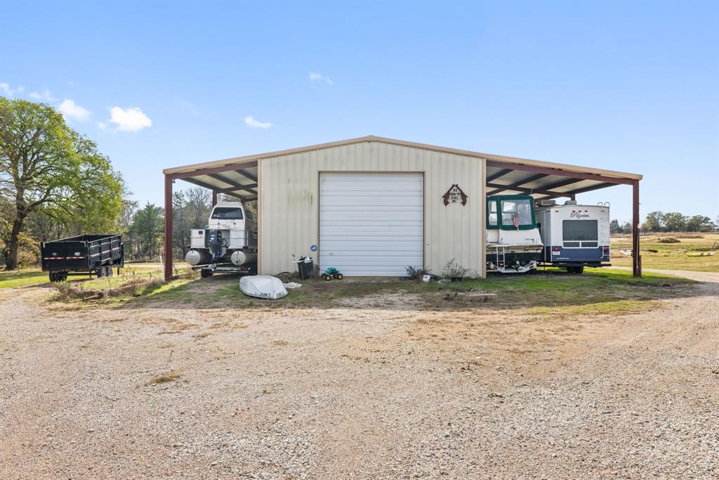 118 Dickey Road Sadler, TX 76264 - Photo 13 of 34 a view of a house with a backyard