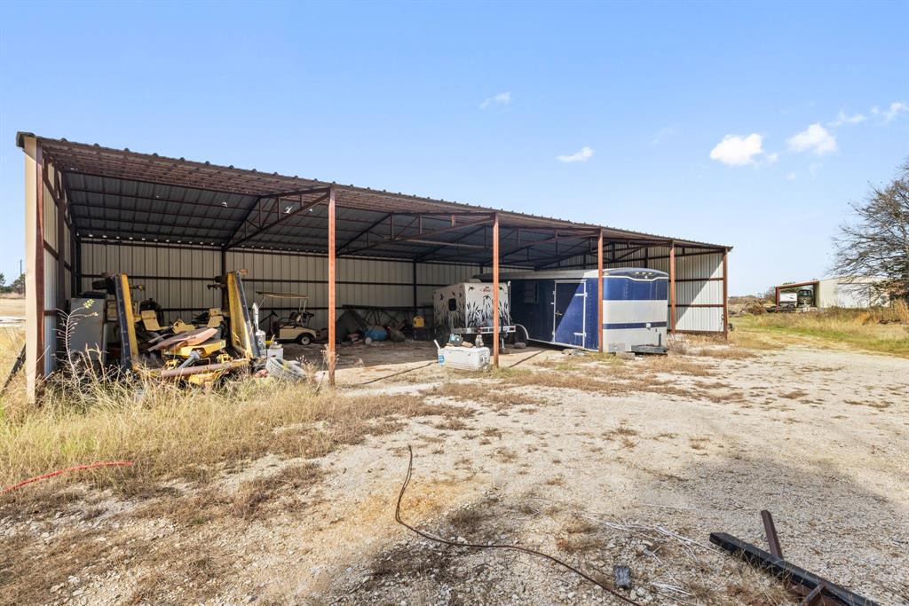118 Dickey Road Sadler, TX 76264 - Photo 16 of 34 a view of a chairs and table in patio