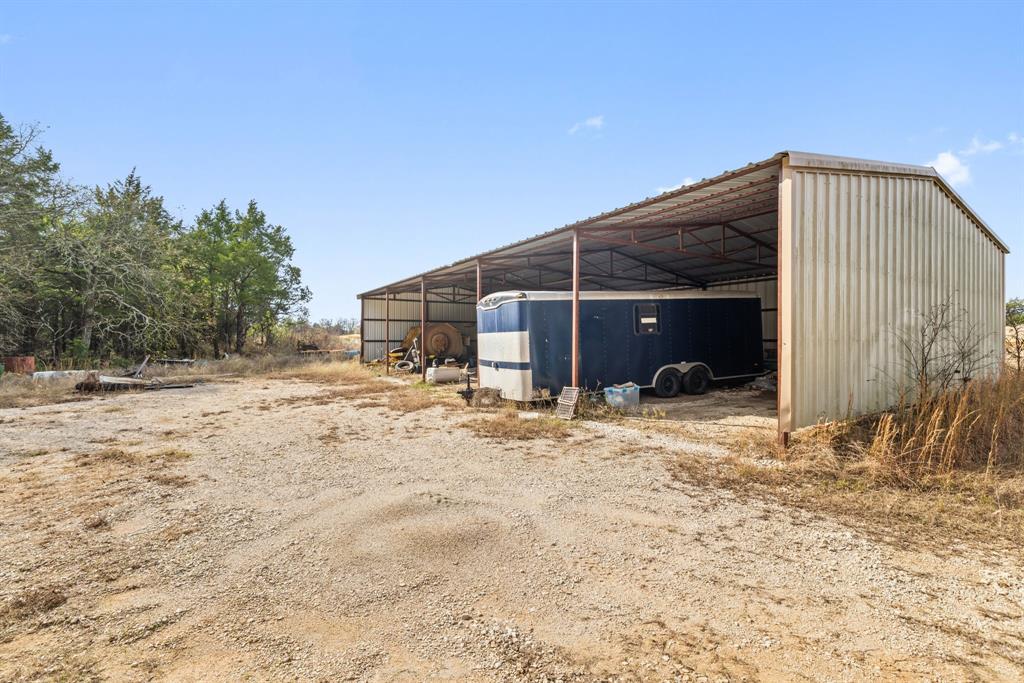 118 Dickey Road Sadler, TX 76264 - Photo 17 of 34 a view of a house with a yard