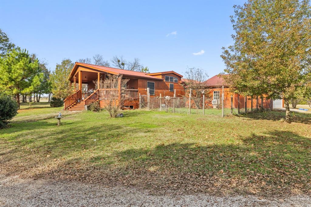 118 Dickey Road Sadler, TX 76264 - Photo 9 of 34 a view of a house with a yard