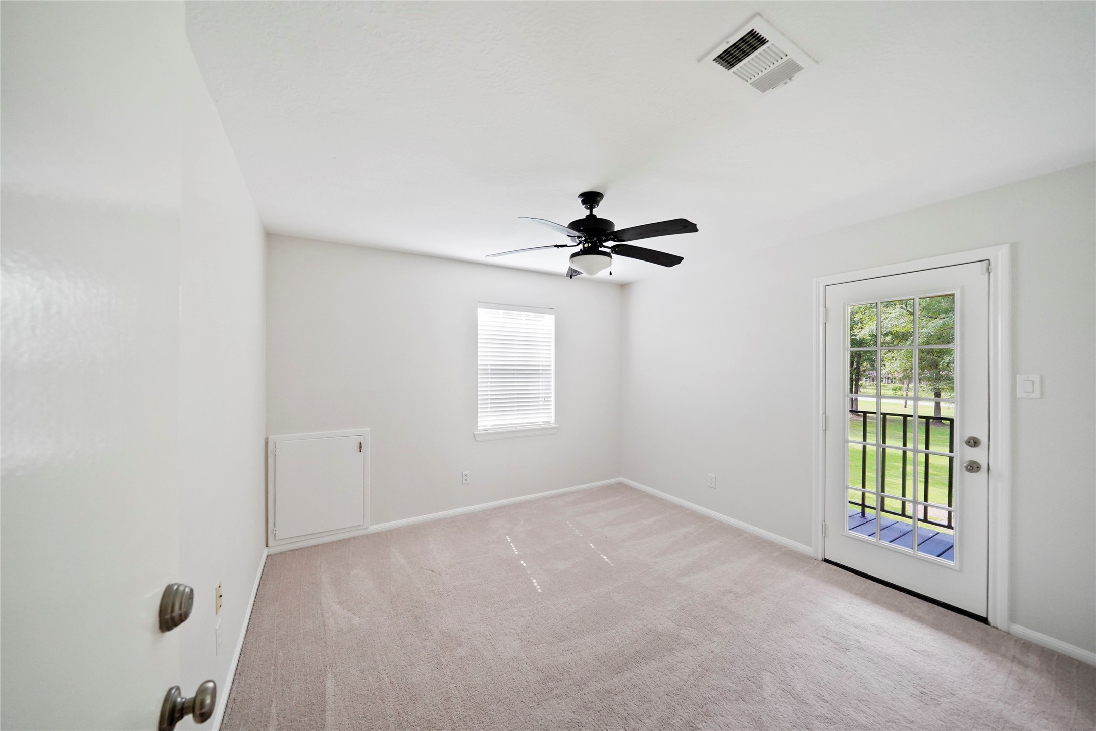 14443 Lyric Road Conroe, TX 77302 - Photo 28 of 49 Upstairs bedroom with access to terrace