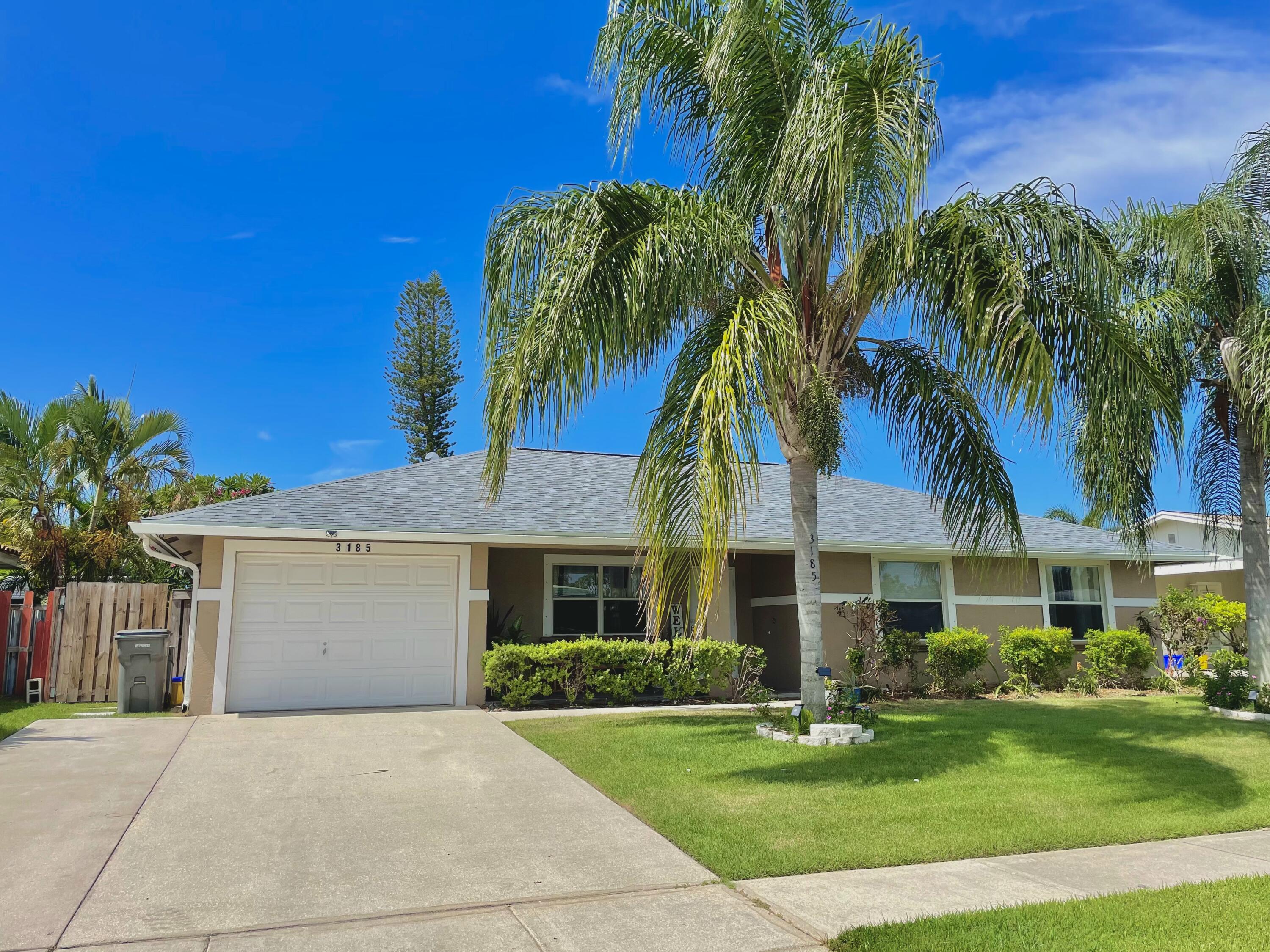 3185 Capri Road Palm Beach Gardens, FL 33410 - Photo 1 of 20 Front of Home