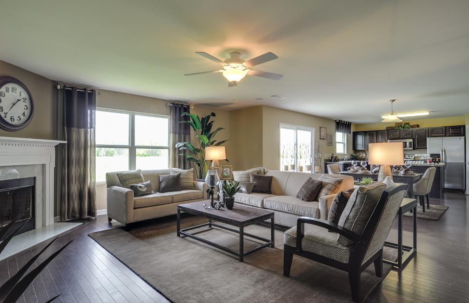 1438 Old Stone Road, Unit 459 Lebanon, TN 37087 - Photo 8 of 20 a living room with furniture a fireplace and a large window