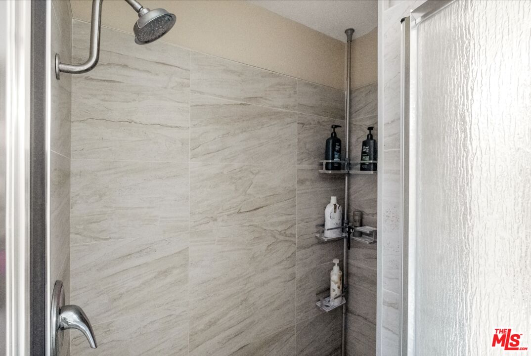 28390 Rey De Copas Lane Malibu, CA 90265 - Photo 11 of 18 a bathroom with a shower