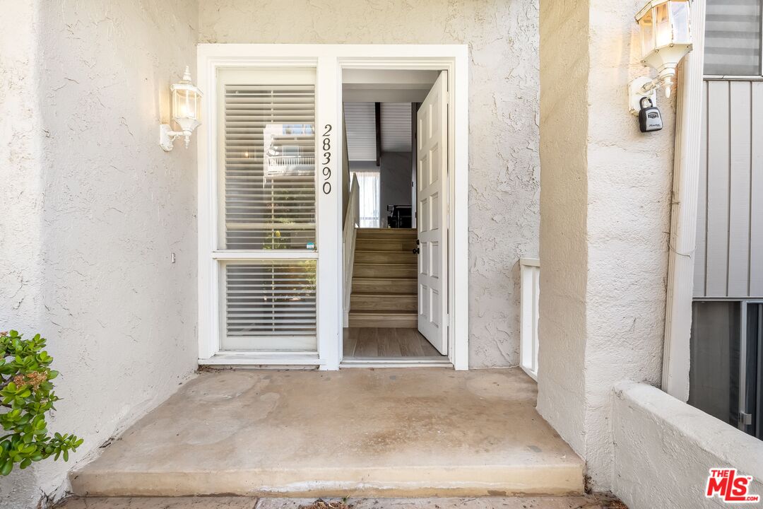 28390 Rey De Copas Lane Malibu, CA 90265 - Photo 2 of 18 a view of front door of house
