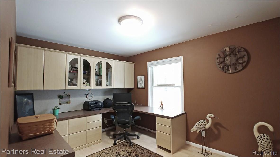 5371 Dutton Road Gregory, MI 48137 - Photo 17 of 72 One of four large bedrooms is currently being used as a main level office.