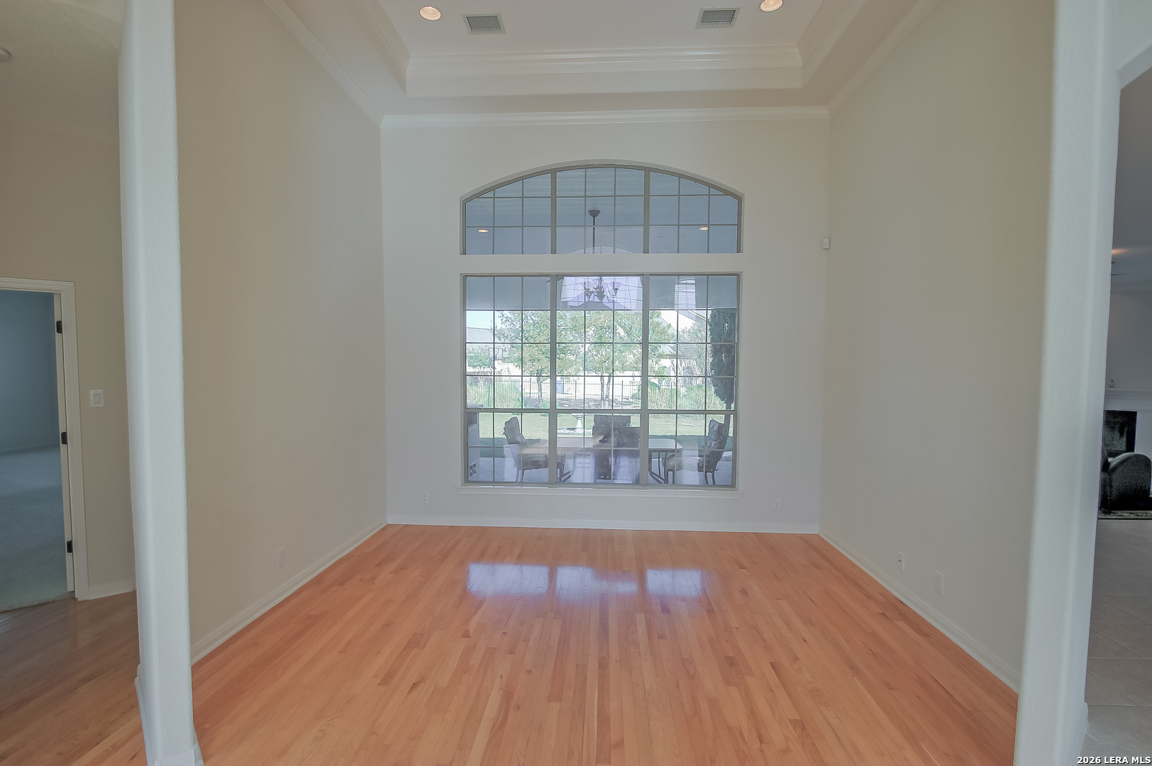 30901 Wood Bine Way Fair Oaks Ranch, TX 78015 - Photo 4 of 23 wooden floor in an empty room with a window