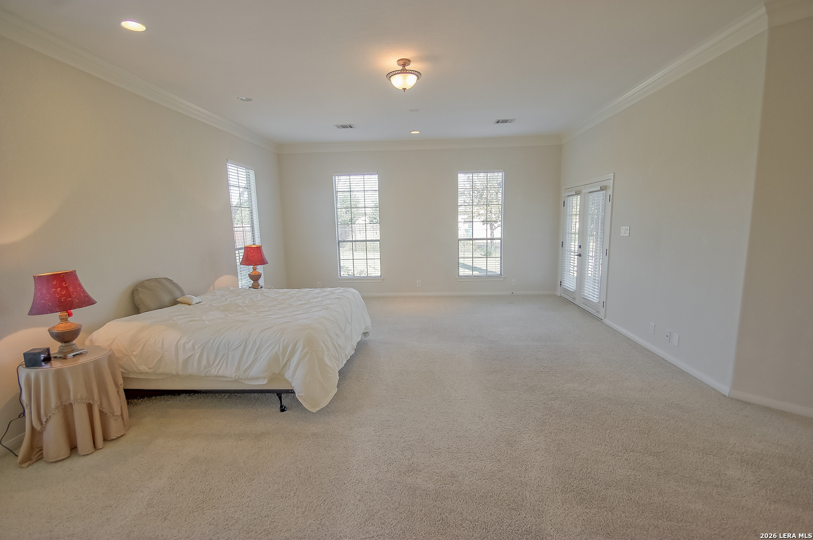 30901 Wood Bine Way Fair Oaks Ranch, TX 78015 - Photo 9 of 23 a bed room with two beds and a couch