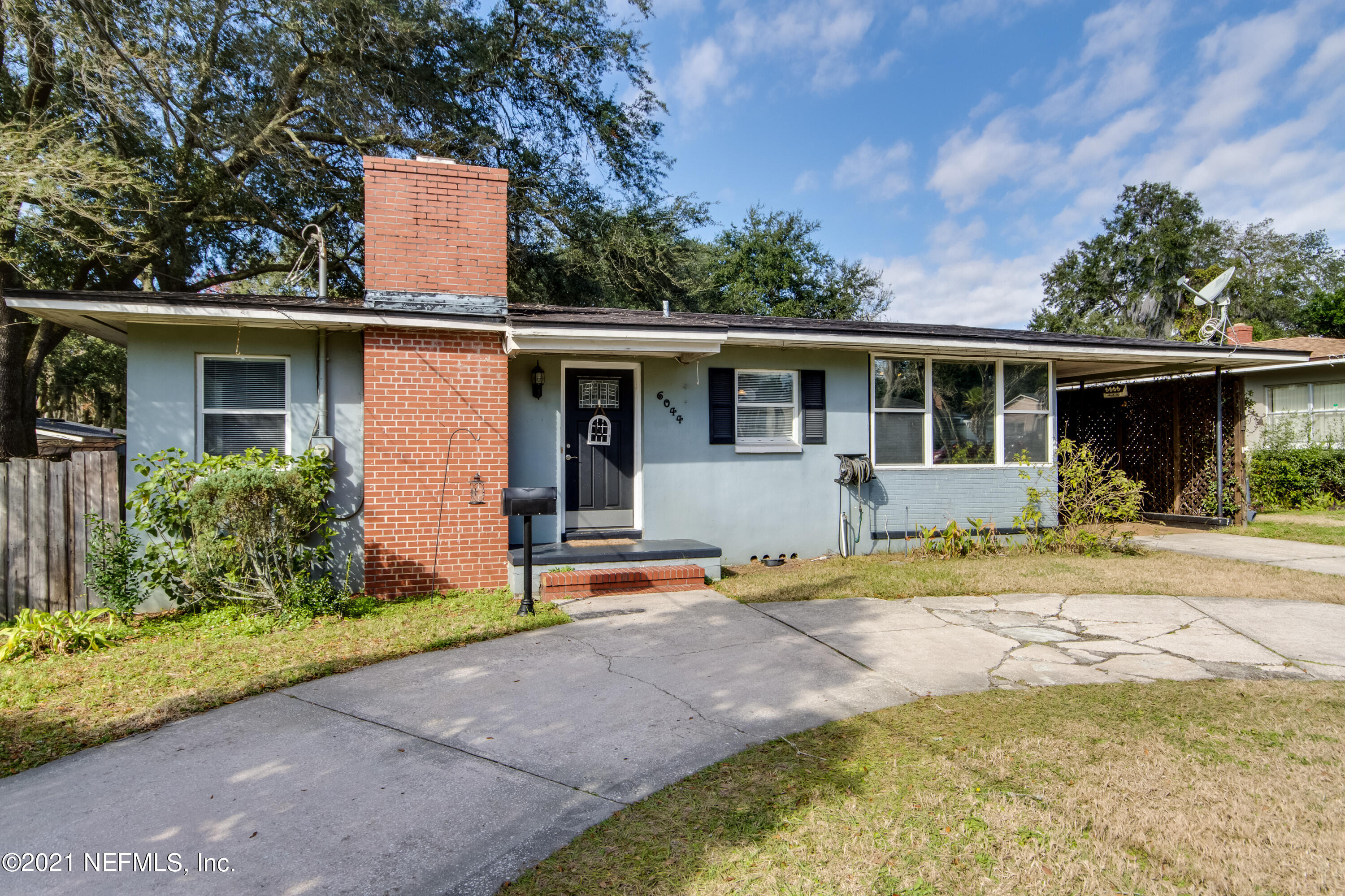 6044 Duke Road Jacksonville, FL 32217 - Photo 1 of 24 front view of a house with a patio