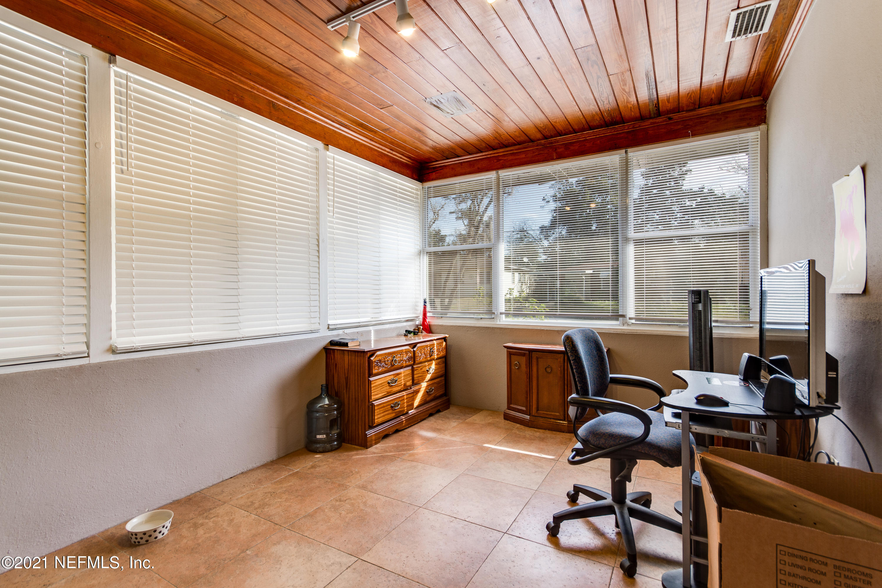 6044 Duke Road Jacksonville, FL 32217 - Photo 13 of 24 a view of workspace with furniture and windows
