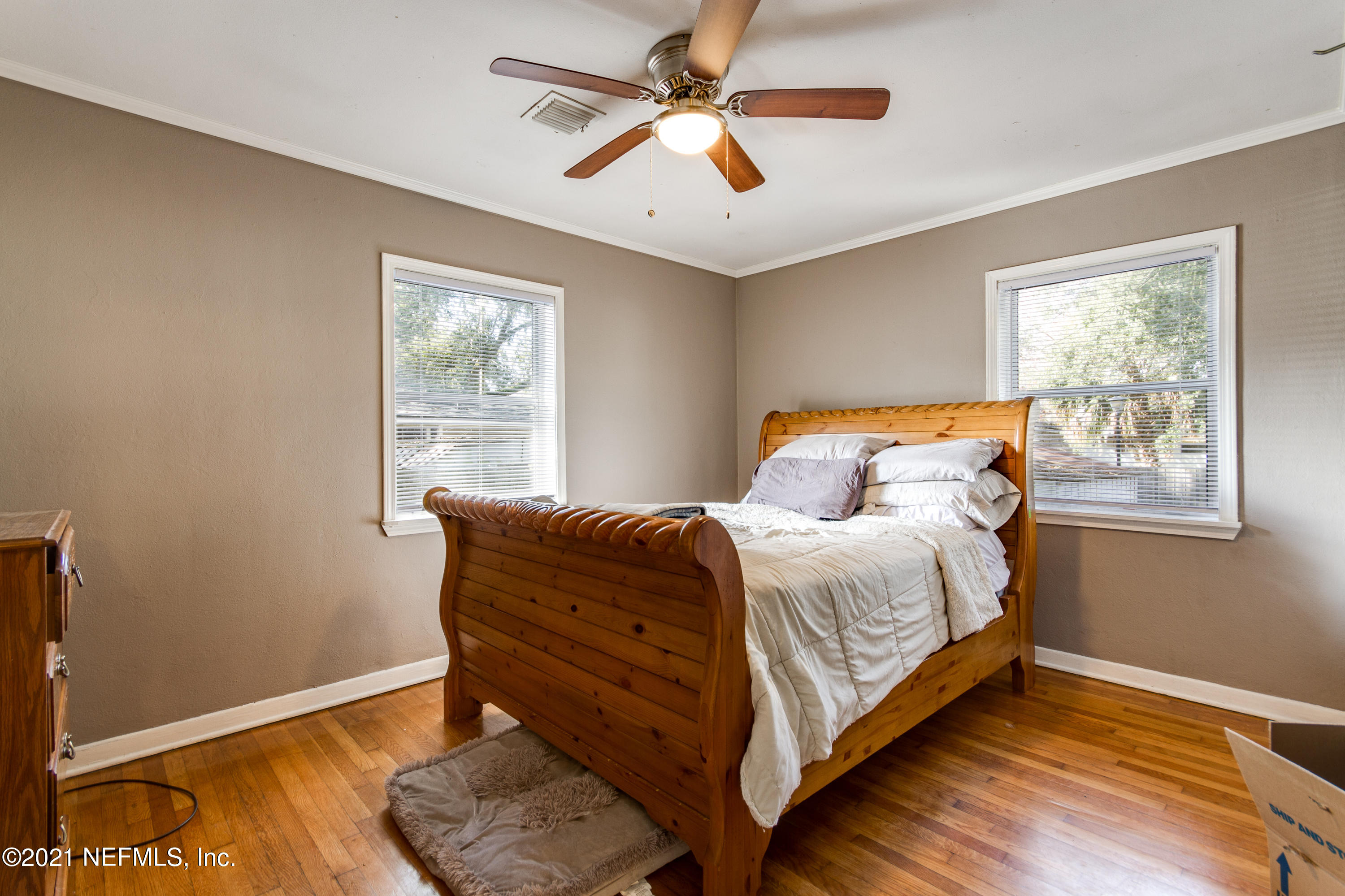 6044 Duke Road Jacksonville, FL 32217 - Photo 15 of 24 a bedroom with a bed and a window