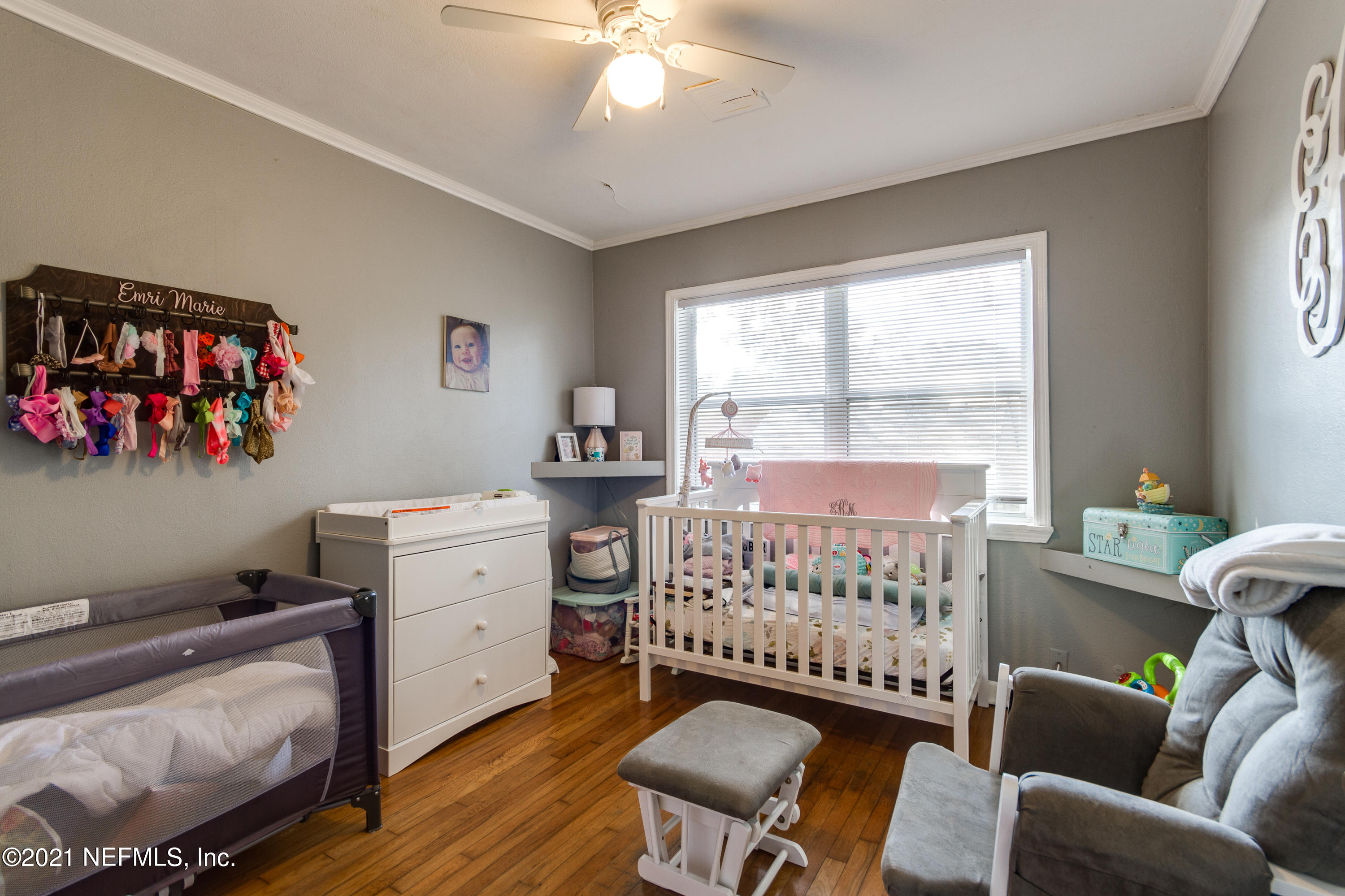 6044 Duke Road Jacksonville, FL 32217 - Photo 16 of 24 a room with furniture and a window