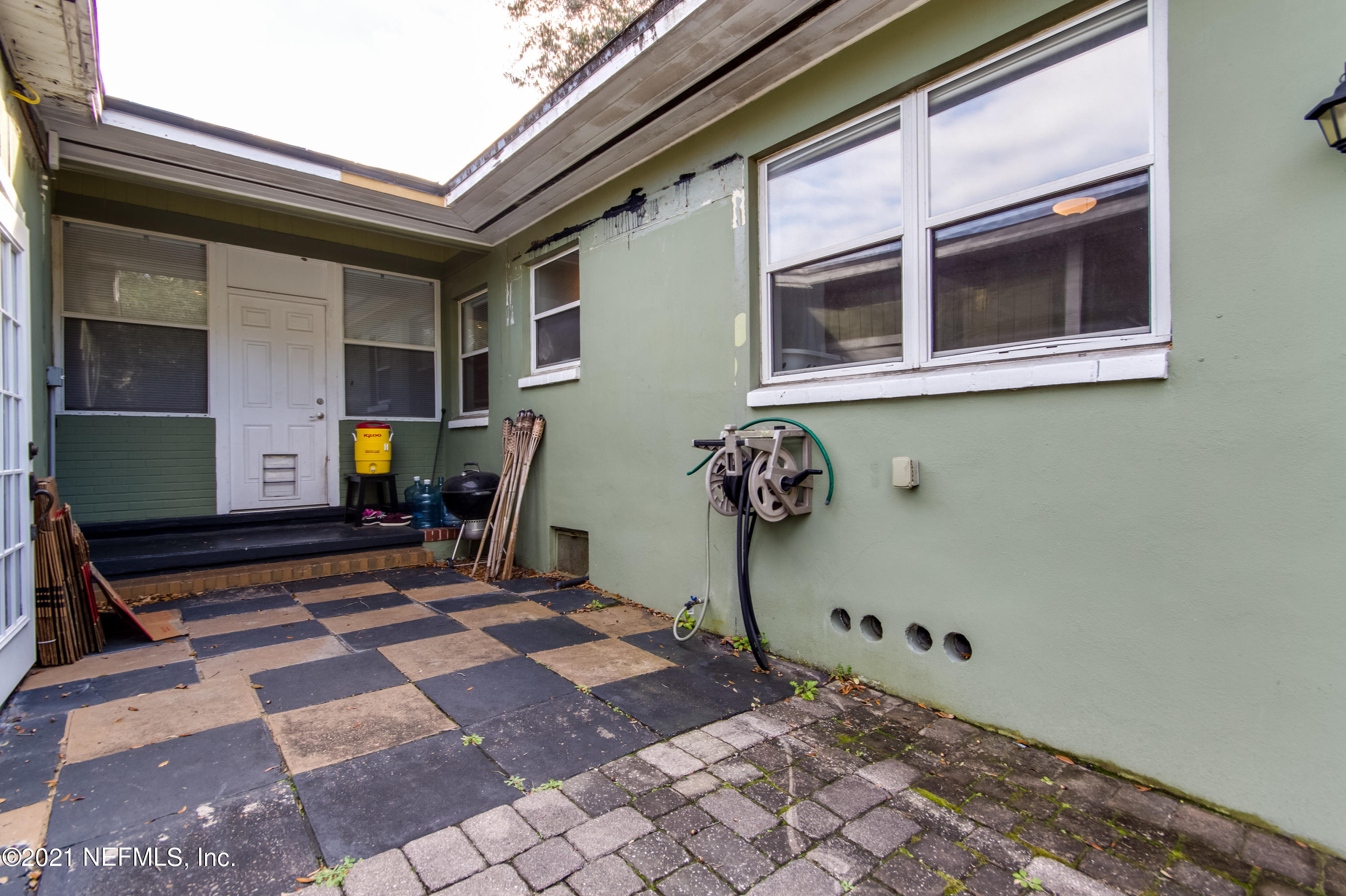 6044 Duke Road Jacksonville, FL 32217 - Photo 20 of 24 a front view of a house with parking space
