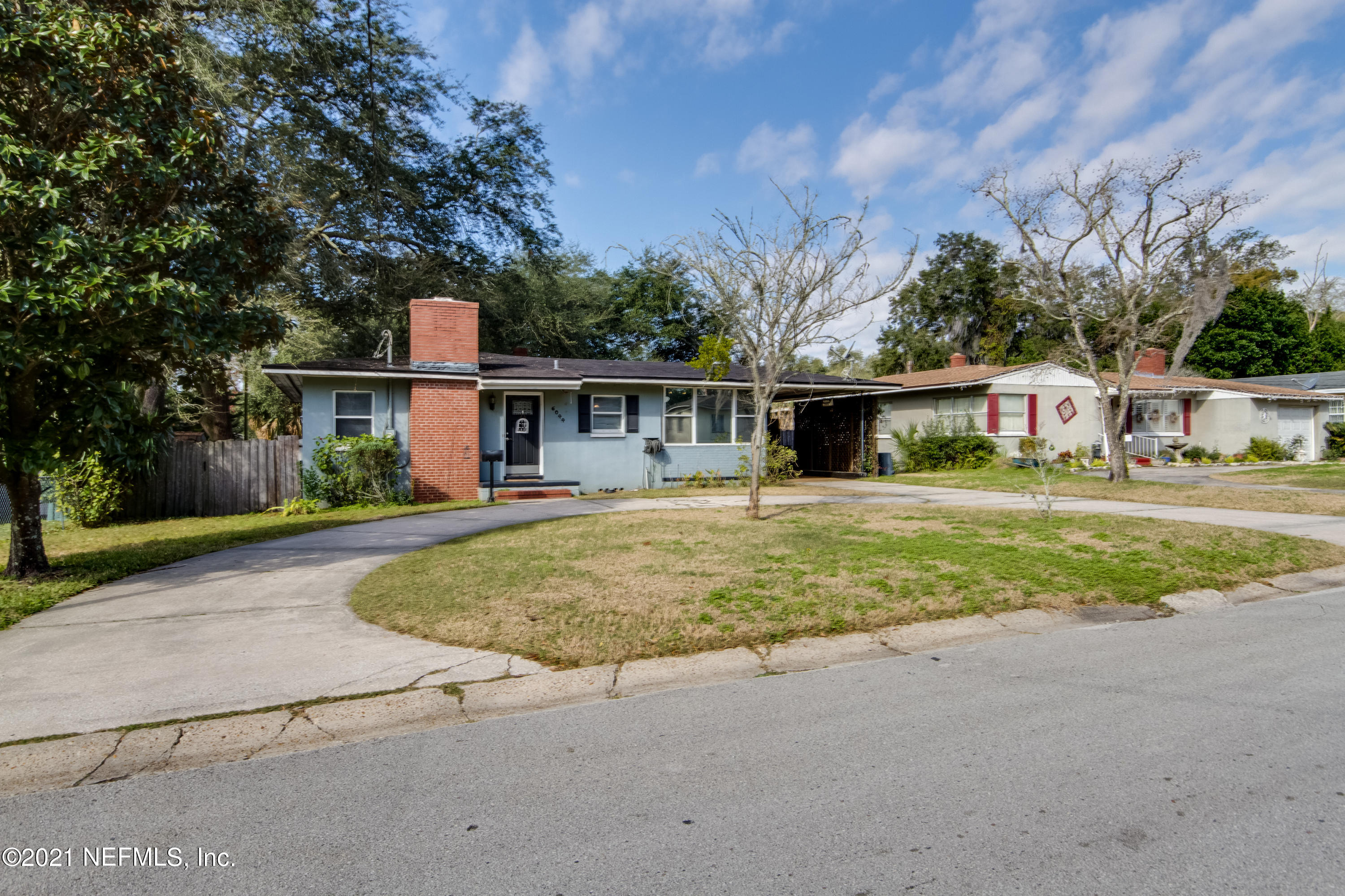 6044 Duke Road Jacksonville, FL 32217 - Photo 2 of 24 front view of a house with a yard