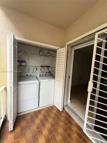 a view of a balcony with chairs