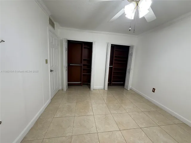 an empty room with a bathroom