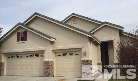 10096 Cascade Falls Drive Reno, NV 89521 - Photo 1 of 1 a view of a house with a garage and balcony