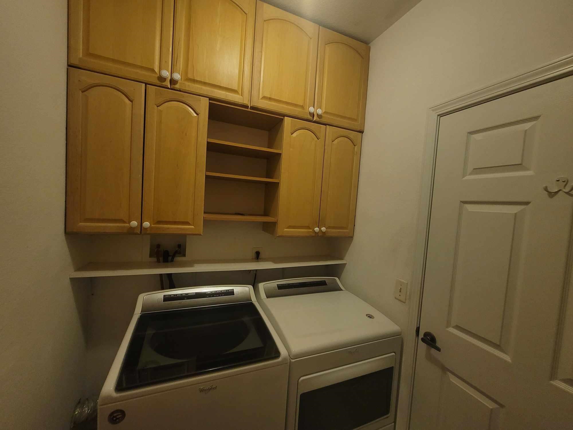 2431 Vista Cove Road St. Augustine, FL 32084 - Photo 25 of 33 a utility room with dryer and washer