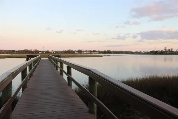 a front view of a house with yard