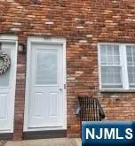 a front view of a building with glass door