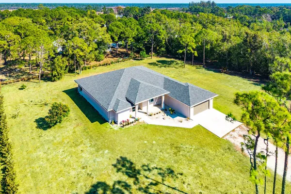 a view of a swimming pool with an outdoor space