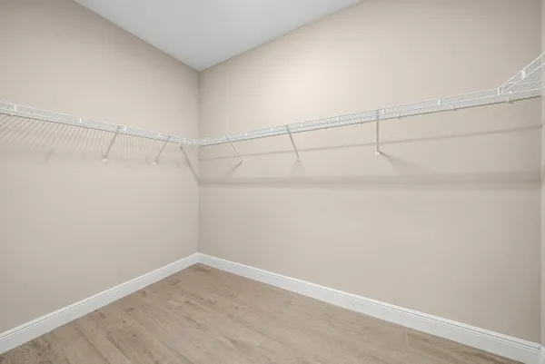 a view of a room with racks on the wall