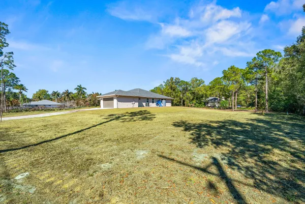 a view of an outdoor space and a yard