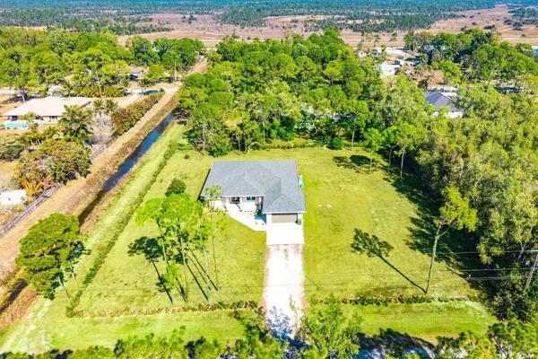 a view of yard with swimming pool