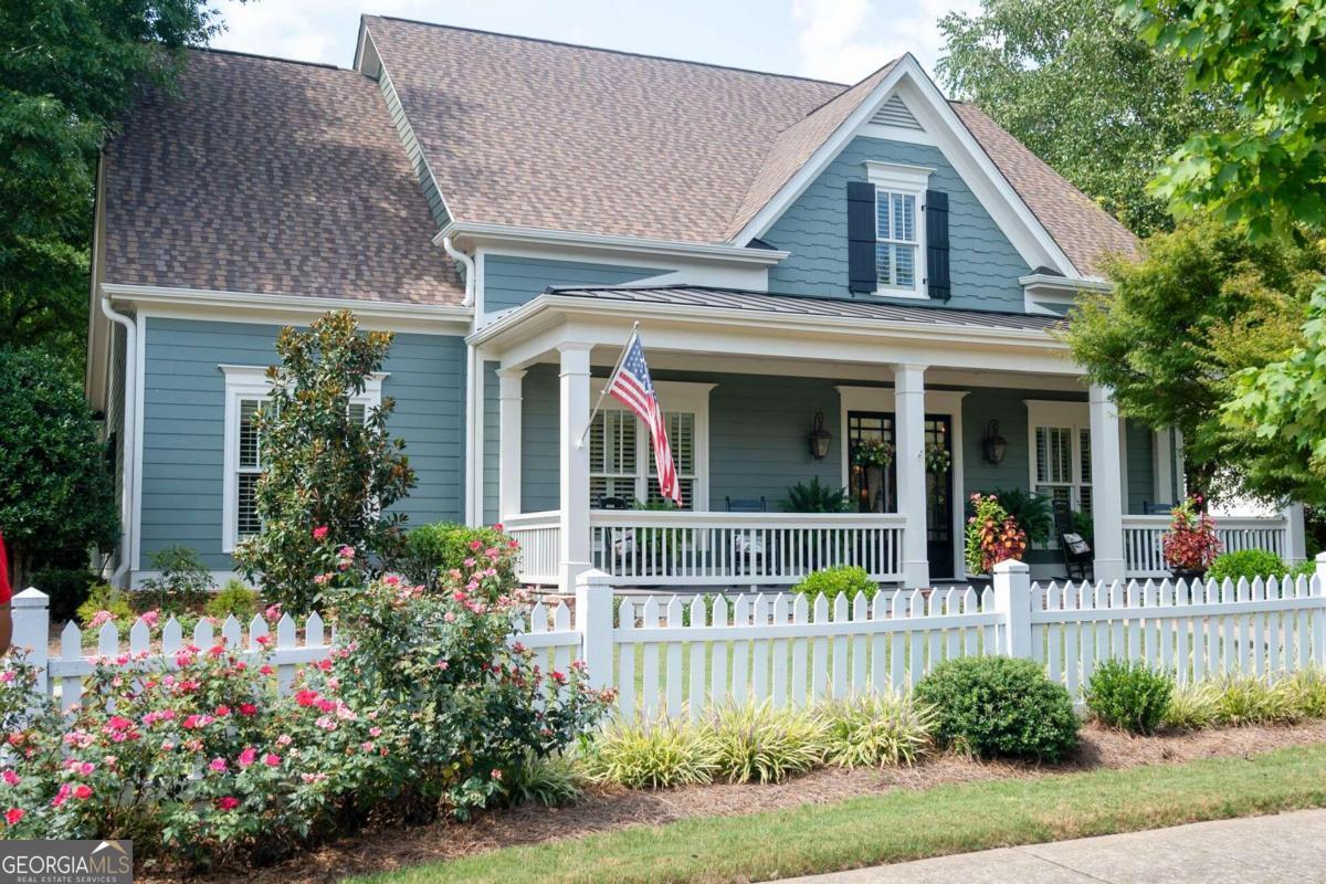 511 Navan Lane Statham, GA 30666 - Photo 1 of 1 a front view of a house with a garden