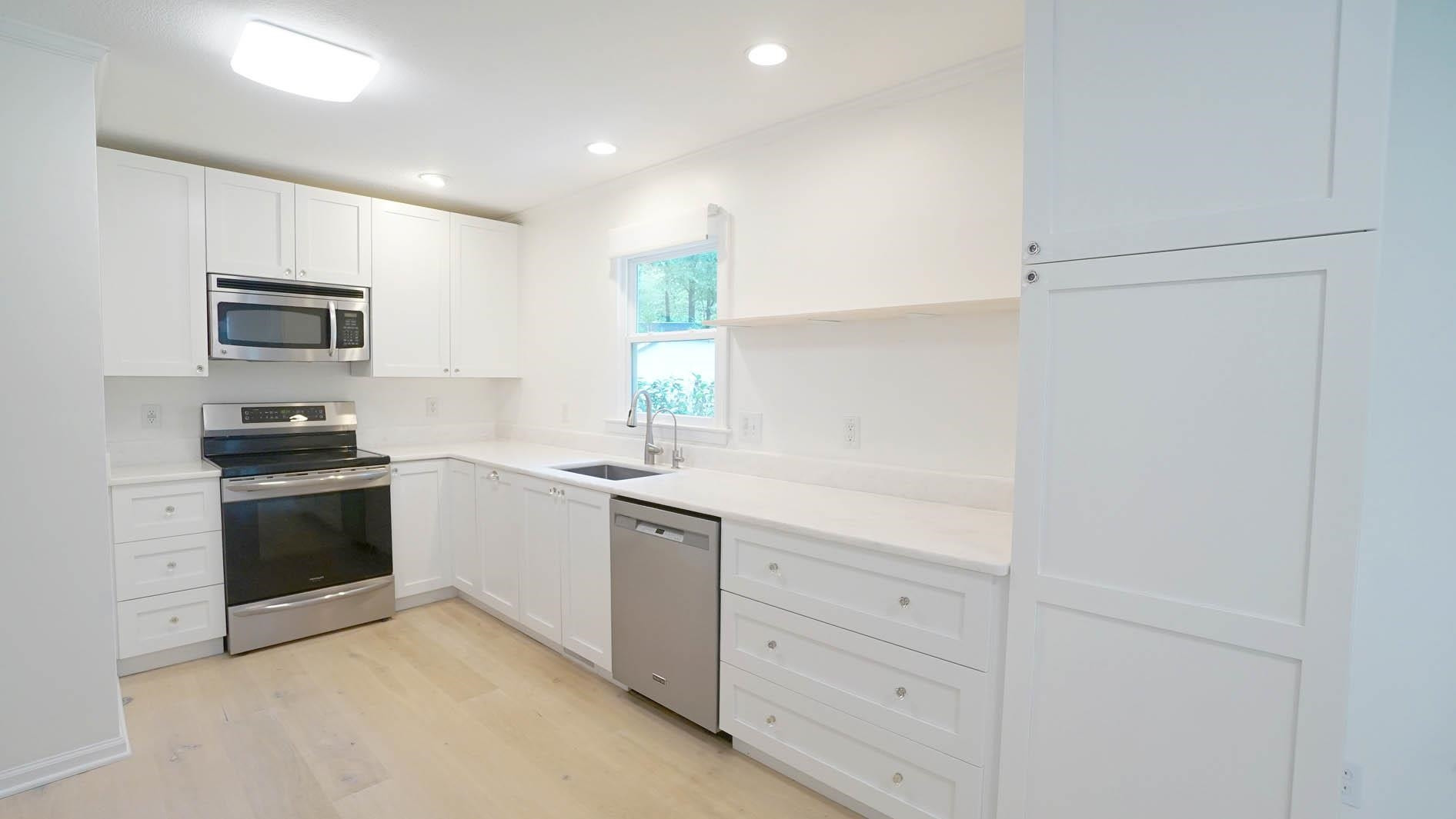 302 Abbey Lane Cary, NC 27511 - Photo 9 of 38 *Plenty of Counter & Cabinet Space*