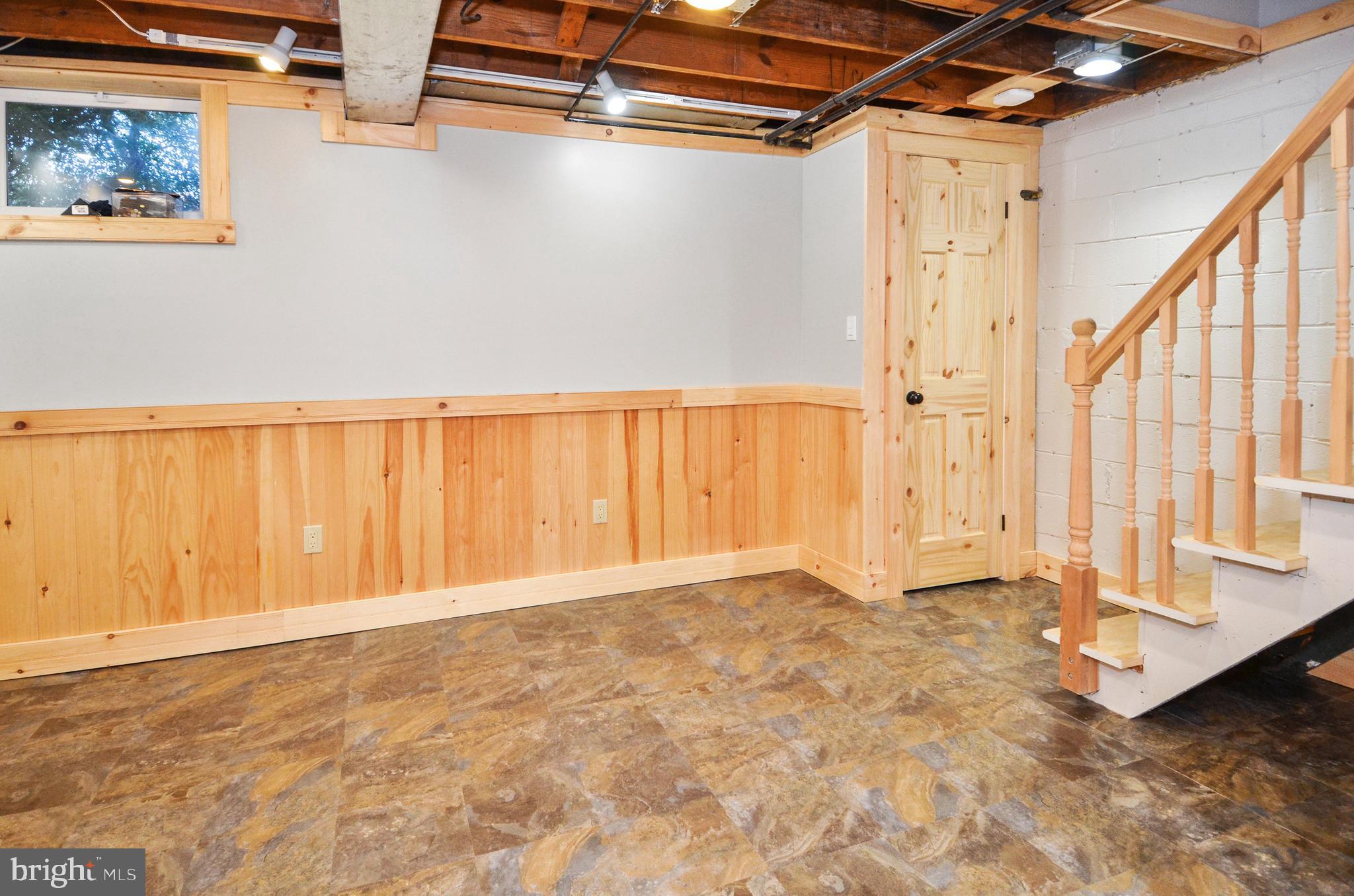 7746 Wynbrook Road Baltimore, MD 21224 - Photo 22 of 32 LOWER LEVEL REC ROOM