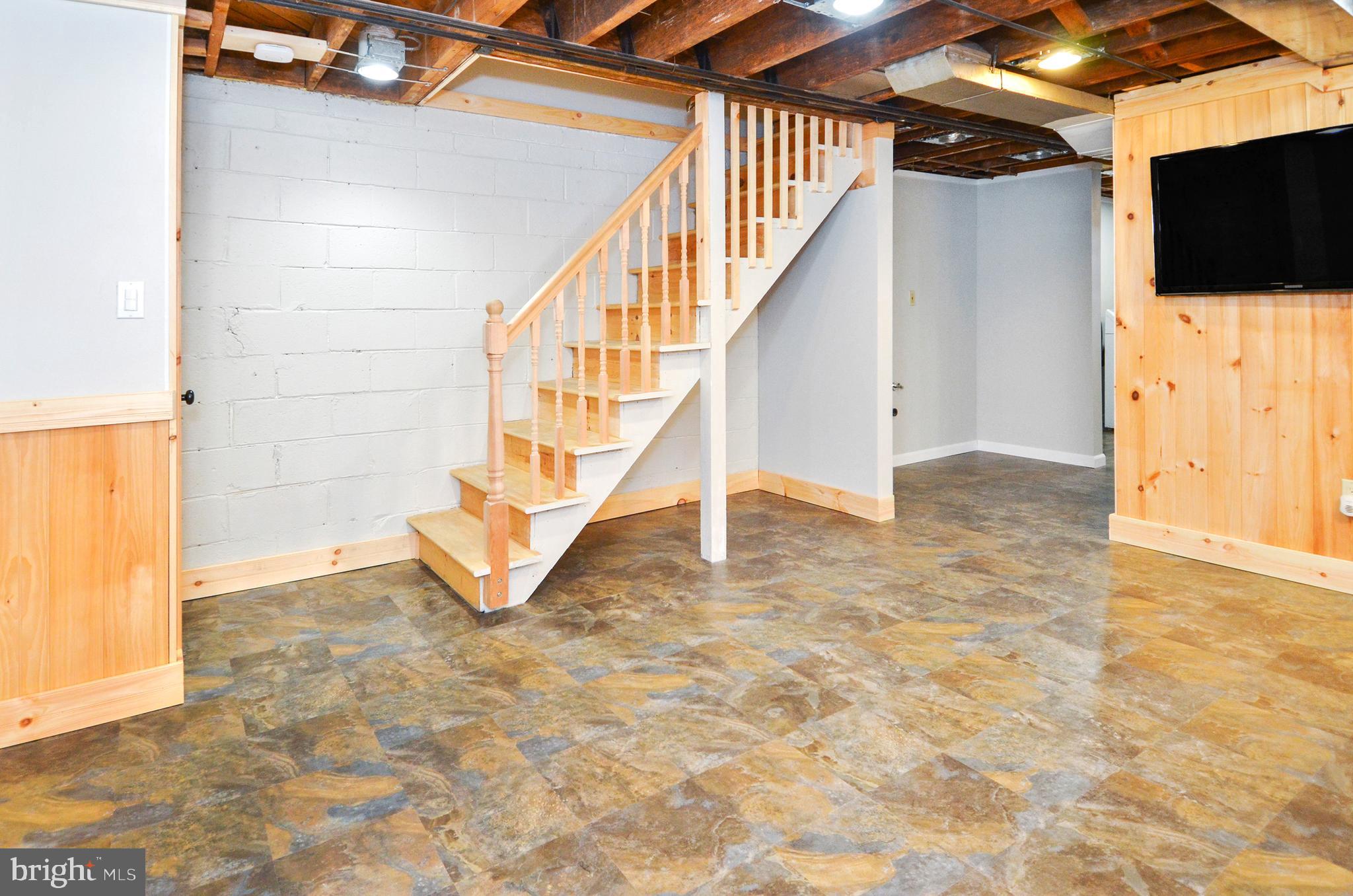 7746 Wynbrook Road Baltimore, MD 21224 - Photo 23 of 32 LOWER LEVEL REC ROOM