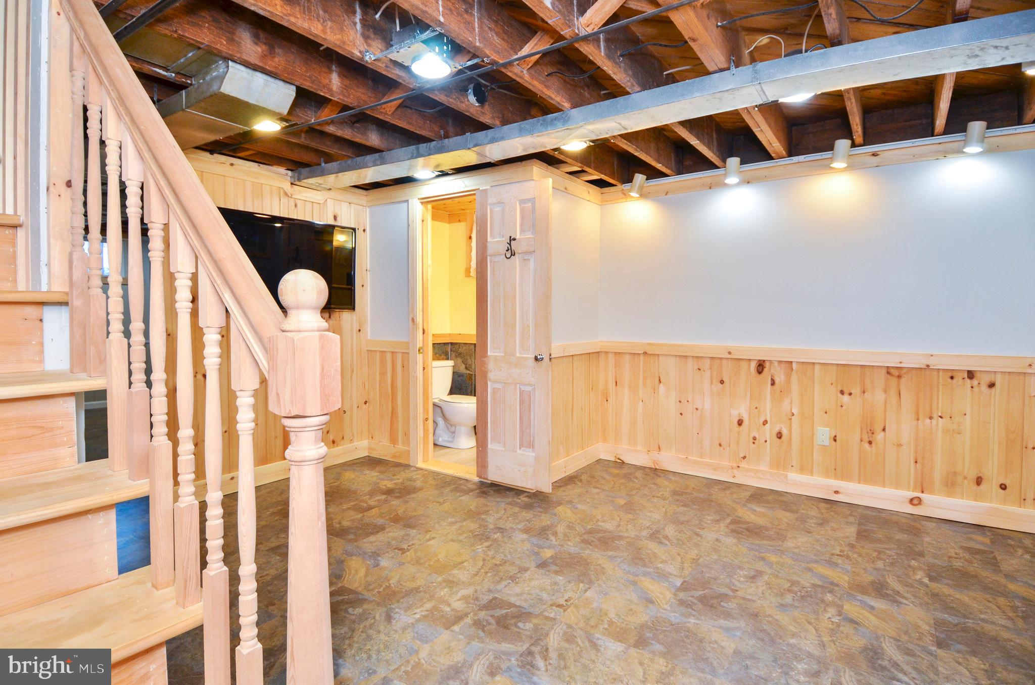 7746 Wynbrook Road Baltimore, MD 21224 - Photo 24 of 32 LOWER LEVEL REC ROOM