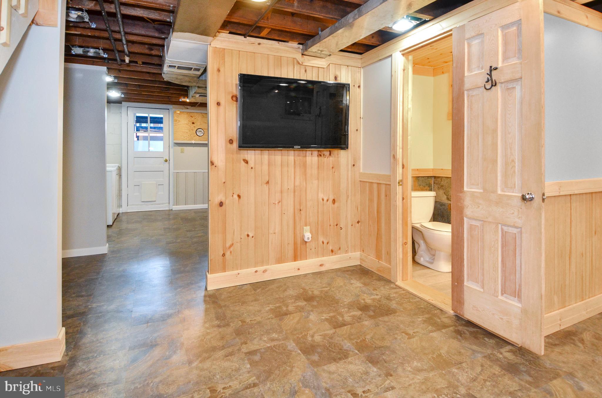 7746 Wynbrook Road Baltimore, MD 21224 - Photo 25 of 32 LOWER LEVEL REC ROOM