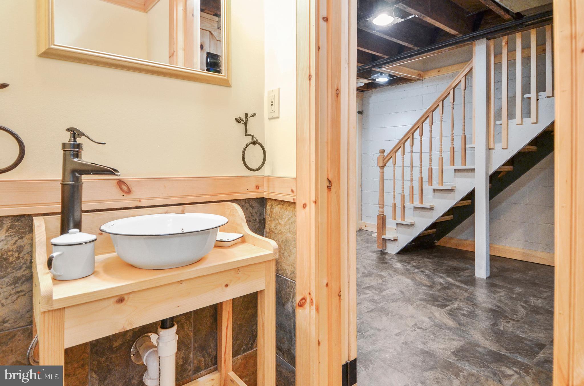 7746 Wynbrook Road Baltimore, MD 21224 - Photo 27 of 32 LOWER LEVEL HALF BATH