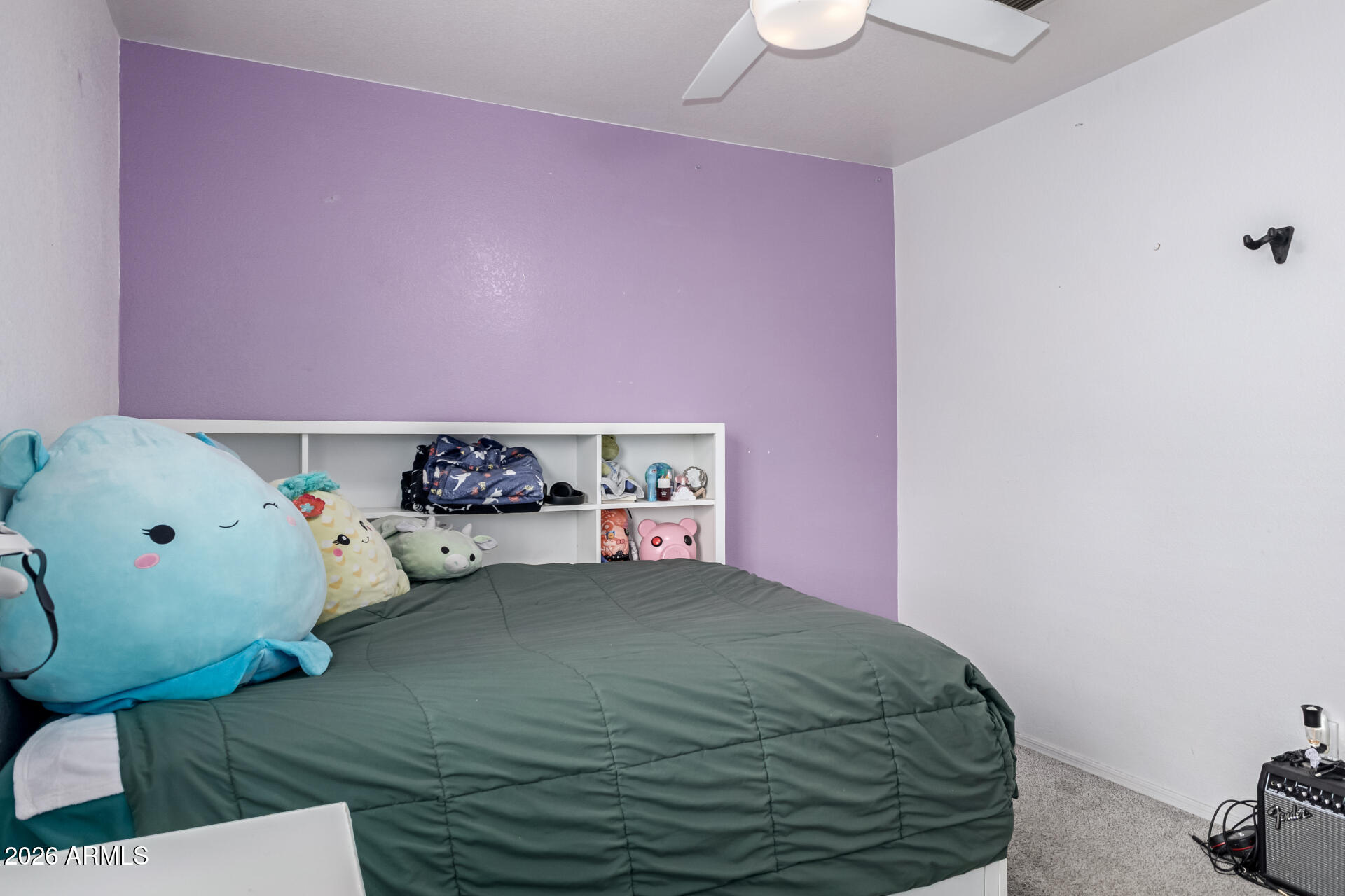3407 East Escuda Road Phoenix, AZ 85050 - Photo 21 of 32 a bedroom with a bed and a dresser