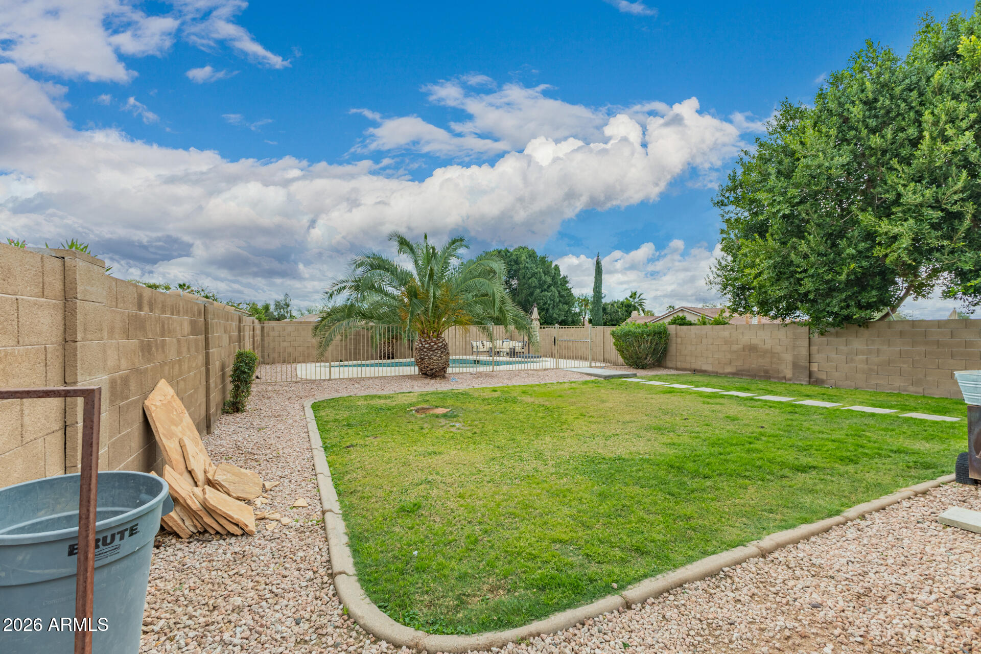 3407 East Escuda Road Phoenix, AZ 85050 - Photo 25 of 32 a view of a swimming pool with a patio
