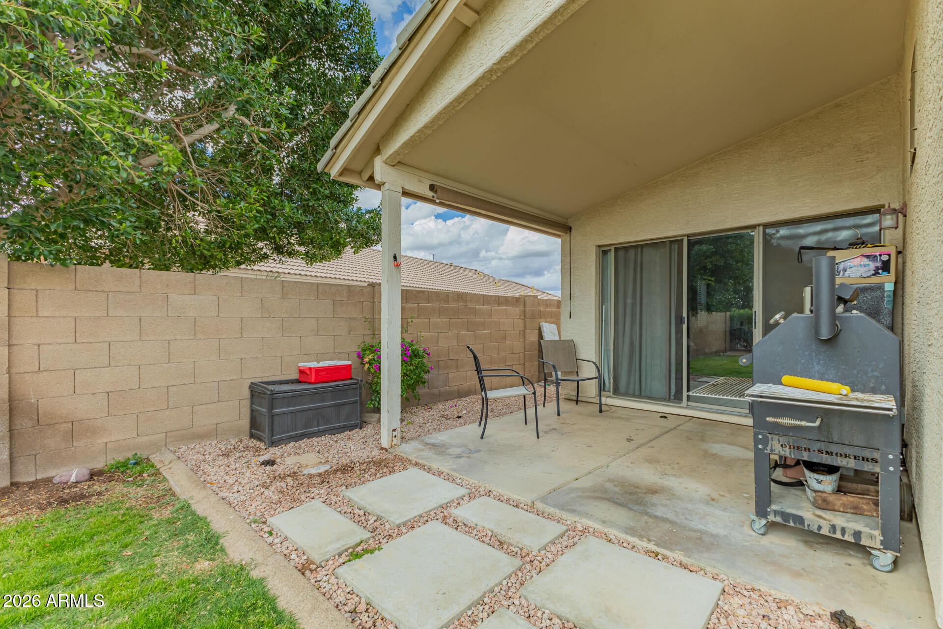 3407 East Escuda Road Phoenix, AZ 85050 - Photo 32 of 32 a backyard of a house with outdoor seating