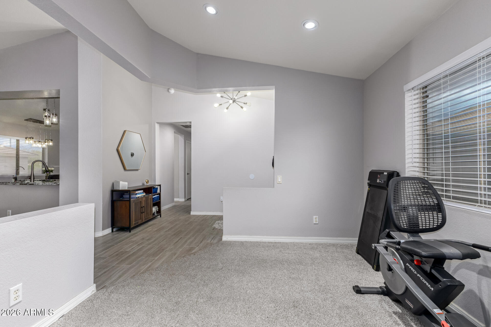 3407 East Escuda Road Phoenix, AZ 85050 - Photo 6 of 32 a view of a room with gym equipment